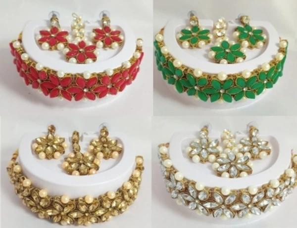 Alloy Jewel SetColor: Green, LCT, Red, White, NEW Combo of 3Color :White, Red, Green, GoldColor Code :White, LCT, Red, GreenModel Number :DJ1039-Combo-1Sales Package Id :4 Necklace , 4 Pair of Earring & 4 Maang TikaaType :Necklace, Earring & Maang Tikka SetBase