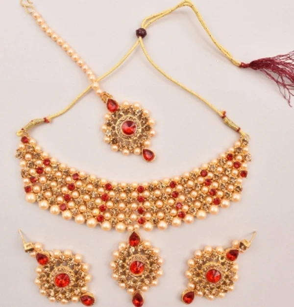 Alloy Jewel SetColor :RedColor Code :RedModel Number :Alloy Gold-plated Jewel Set (red)Sales Package Id :1Type :Necklace, Earring & Maang Tikka SetBase Material :AlloyPlating :Gold-plated7 Days Return Policy, No questions asked.