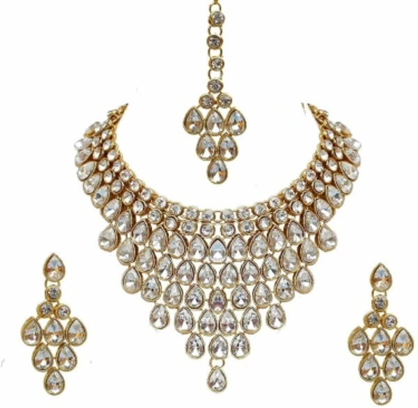Alloy Jewel SetColor :WhiteColor Code :WhiteModel Number :38nowhiteSales Package Id :1Type :Necklace, Earring & Maang Tikka SetBase Material :AlloyPlating :Gold-plated7 Days Return Policy, No questions asked.