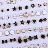 SILVER SHINE Stud Earring White & Black Colour new Fashion Set of 36 Earrings for Women… Plastic Earring SetFor Women, GirlsContemporary CollectionMade of Plastic10 Days Return Policy, No questions asked.