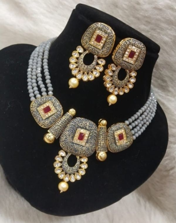 Alloy Jewel SetColor: Blue, Green, Grey, Maroon, YellowColor :Grey, GoldColor Code :GreyModel Number :ZC_Set120_sSales Package Id :2 earrings, 1 NecklaceType :Earring & Necklace SetBase Material :AlloyPlating :NA7 Days Return Policy, No questions asked.