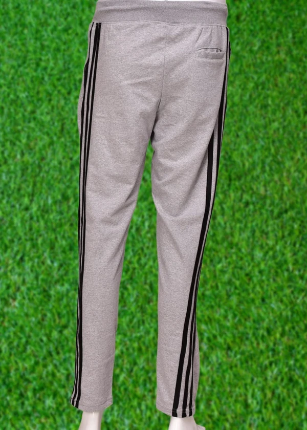 *Human Sparsh Track Pants – Grey Melange*Whether you want to run, relax or sleep, these track pants would be a great choice for you.Grey Colour keeps you relaxed and calm to rejuvenate you for the rest of the time when you’re not wearing it.Design: Solid Colour with Stripes on the sidesPockets: Double Side Pockets with Zip and a Back PocketWaist: It has the elasticated waistband wi - L