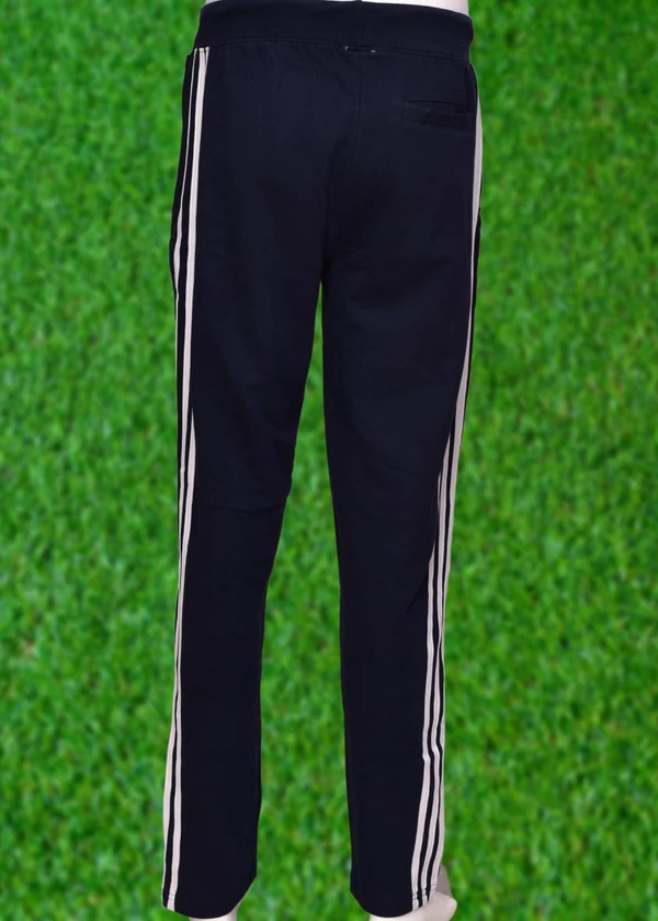 *Human Sparsh Track Pants - Navy Blue*Have the feel of Authority and Calmness at the same time when wearing the Navy Blue Colour.Whether you want to run, relax or sleep, these track pants would be a great choice for you.Design: Solid Colour with Stripes on the sidesPockets: Double Side Pockets with Zip and a Back PocketWaist: It has the elasticated waistband with drawstringsFit: Re - S