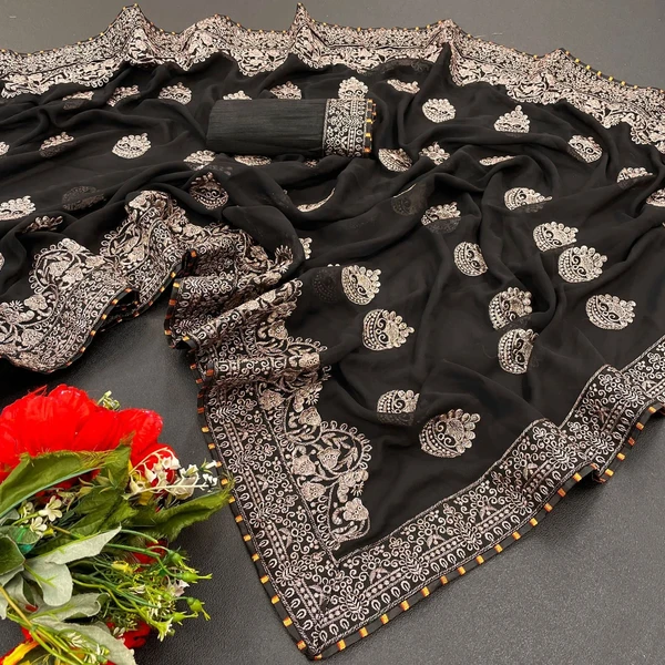 New Launching👉🏻Fabric:-*Georgette* saree with Full Saree Embroidery work👉🏻Blouse:-Satin Banglori with embroidered work            🌹Saree 5.5 MTR and 0.80 MTR Contrast Matching Blouse👉🏻BEST RATE & BEST QULITY ALWAYSReady to ship - Black