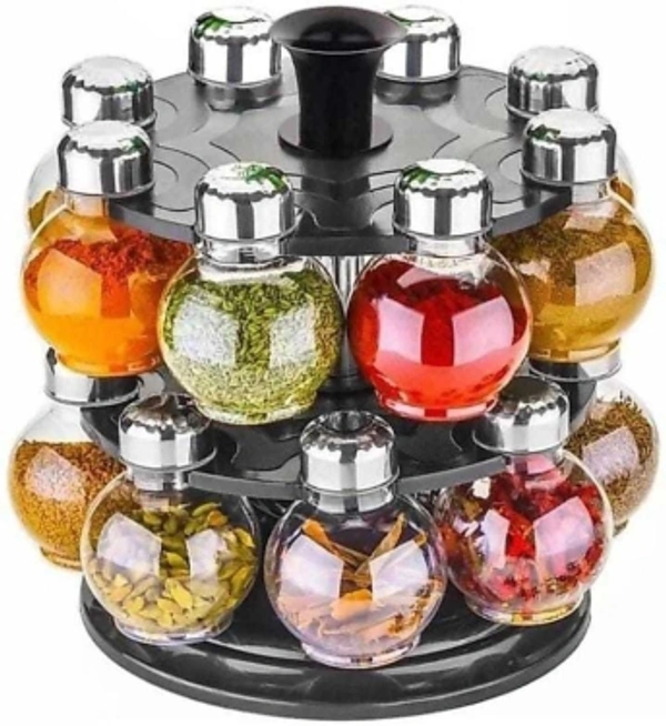 Plastic Big Revolving Spice Rack 16in1/Masala Rack 16 Piece Spice Set (Plastic) 1 Piece Spice SetSales Package :1 condiment setPack of :1Color :Clear, SteelMaterial :PlasticModel Number :360Ã?Â° Revolving Spice Rack Masala Rack Spice Box Masala Box Masala Container (1 Stand,16 Plastic Bottles With Steel Cap) Set 16 Piece Spice Set (Plastic)_sp1Model Name :Plastic Big Revolving Spic
