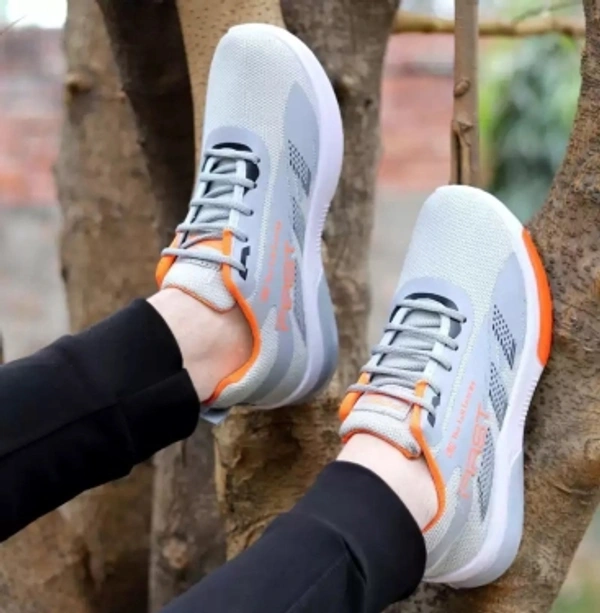 Running Shoes For MenArticle Number :74Brand :CrazylyColor Code :GREYSize in Number :41UK India Size :7color :Grey, WhiteIdeal For :Men7 Days Return Policy, No questions asked. - 9