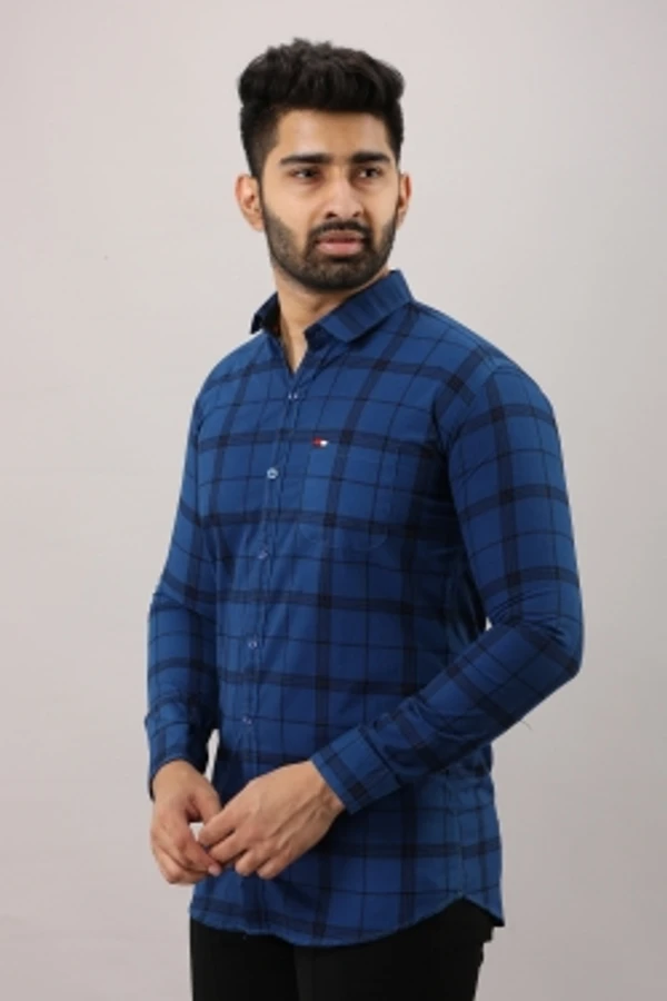 Surhi Men Checkered Casual Blue ShirtFabric: Pure CottonSlim Fit, Full SleevePattern: CheckeredSet of 1. , 10 Days Return Policy, No questions asked. - M