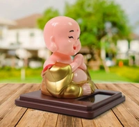 Solar Power Moving Head Buddha Statue (DD06) - 15*14*7 Cm