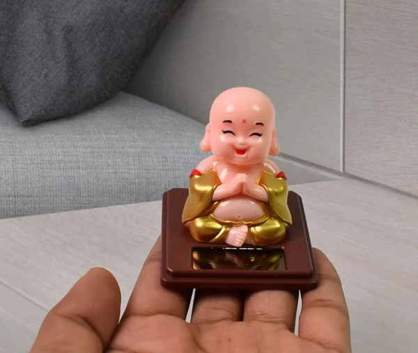 Solar Power Moving Head Buddha Statue (DD06) - 15*14*7 Cm