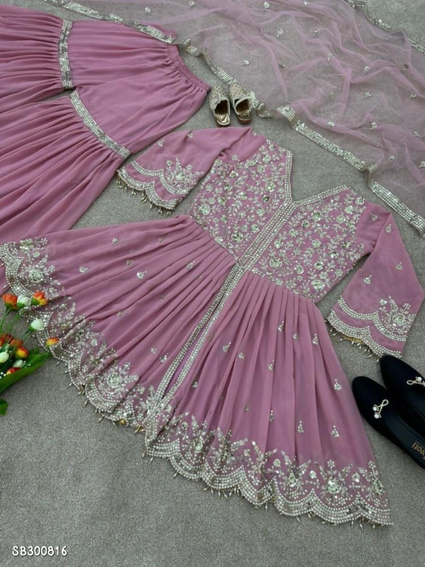 Catalog Name: *Top and sharara plazzo with dupatta*🧵*Fabric Detail*🧵👚* Top *👚*Top Fabric *     - Free Size