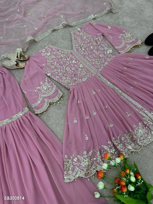 Catalog Name: *Top and sharara plazzo with dupatta*🧵*Fabric Detail*🧵👚* Top *👚*Top Fabric *     - Free Size