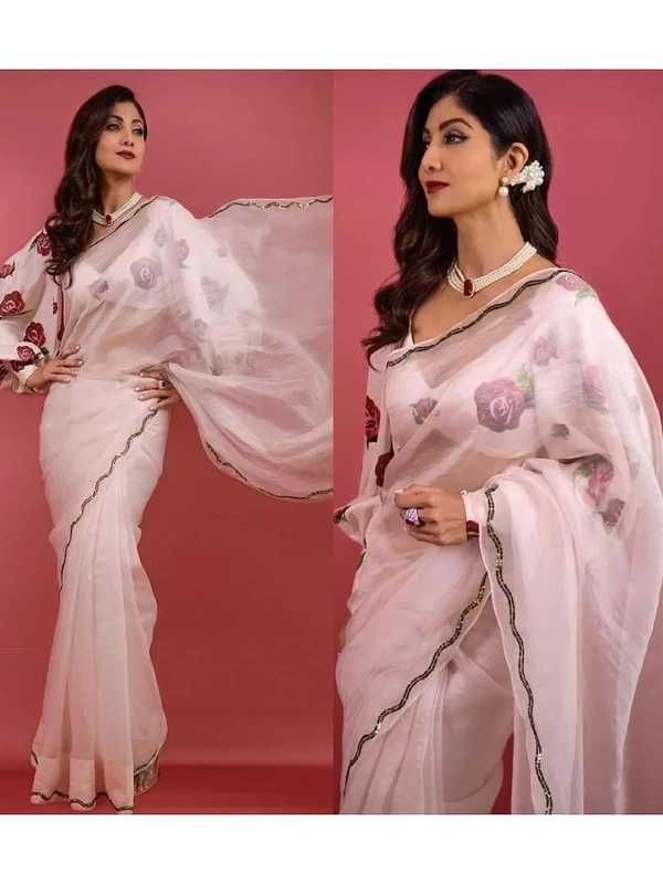 Elegant baby pink organza saree Saree Fabric- Organza   Saree length 5.5 mtr   Blouse Fabric- Tafetta Silk  Blouse length 0.8 mtr ( Unstitched )  - Baby Pink