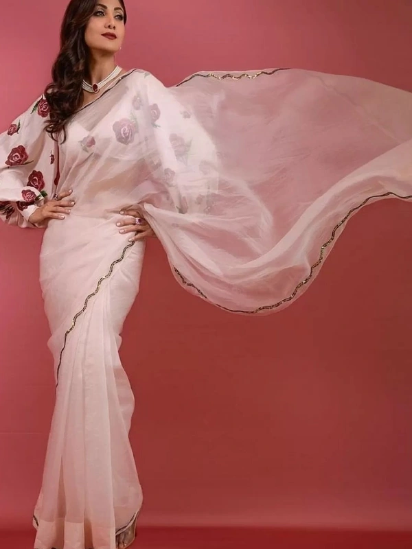 Elegant baby pink organza saree Saree Fabric- Organza   Saree length 5.5 mtr   Blouse Fabric- Tafetta Silk  Blouse length 0.8 mtr ( Unstitched )  - Baby Pink