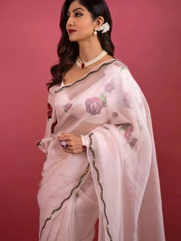 Elegant baby pink organza saree Saree Fabric- Organza   Saree length 5.5 mtr   Blouse Fabric- Tafetta Silk  Blouse length 0.8 mtr ( Unstitched )  - Baby Pink