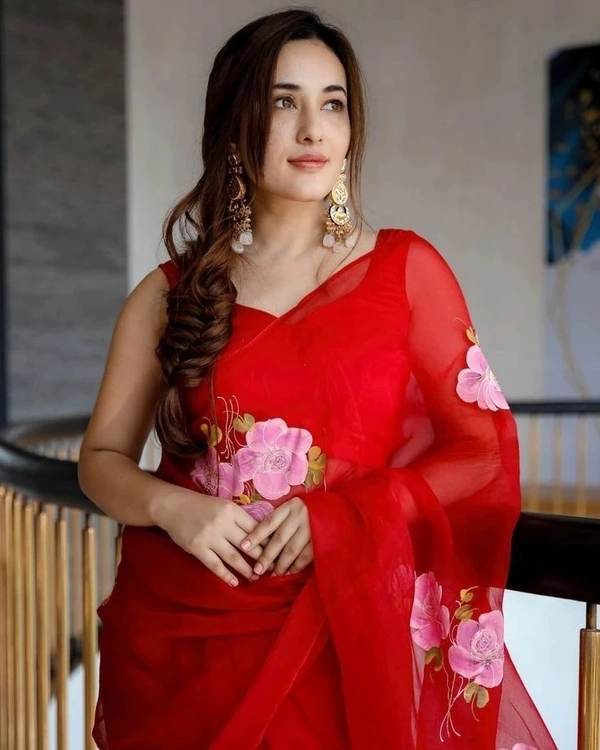 Floral Red Organza Saree Fabric- Organza   Saree length 5.5 mtr   Blouse Fabric- Tafetta Silk  Blouse length 0.8 mtr ( Unstitched )  - Red