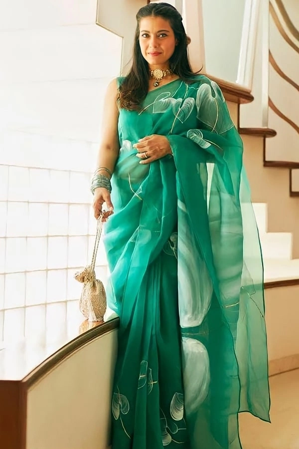 Floral Kajol Style Organza Saree Fabric- Organza   Saree length 5.5 mtr   Blouse Fabric- Tafetta Silk  Blouse length 0.8 mtr ( Unstitched ) 