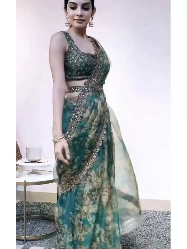 Green organza embroidered and sequence work saree - green
