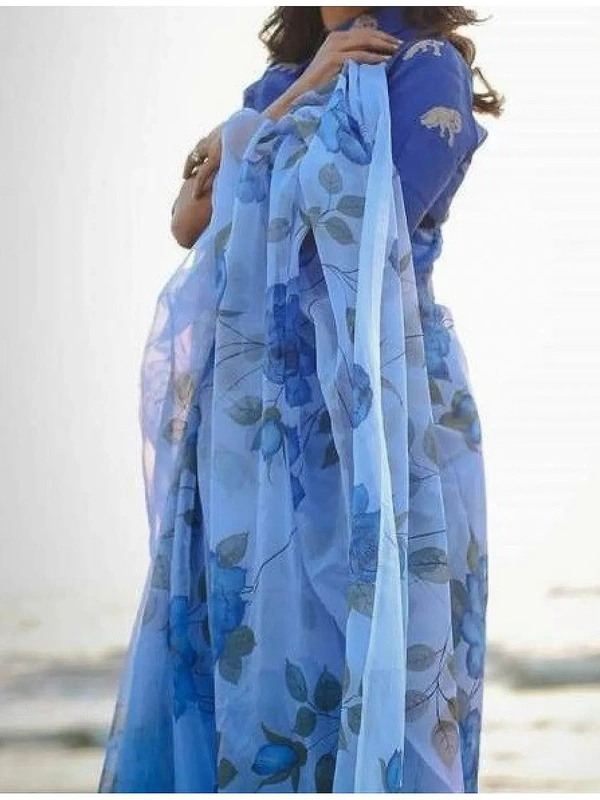 Sky blue flower printed organza saree