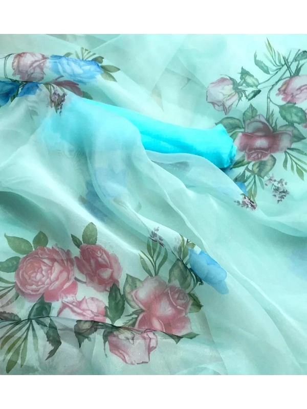 Sea green flower printed organza saree