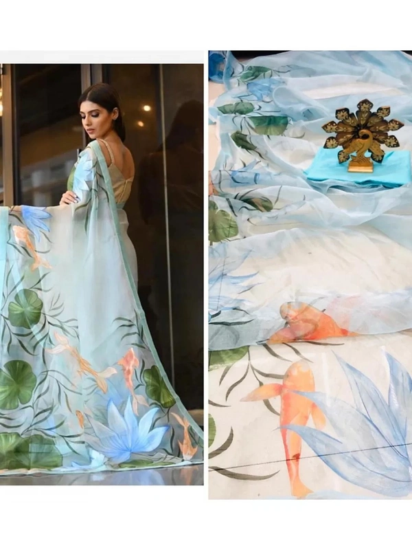 Sky blue lake printed organza saree