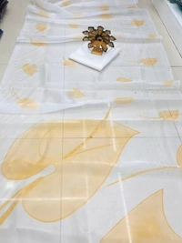 White organza yellow leaf printed saree