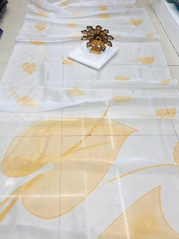 White organza yellow leaf printed saree