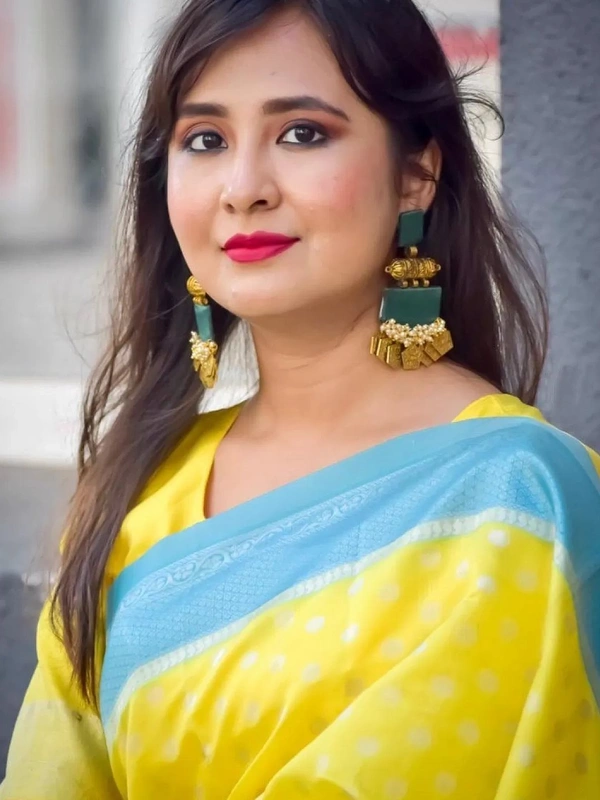 Yellow lichi silk jacquard weaving work saree