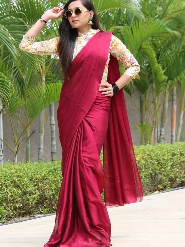 Maroon rangoli silk party wear saree with embroidered blouse