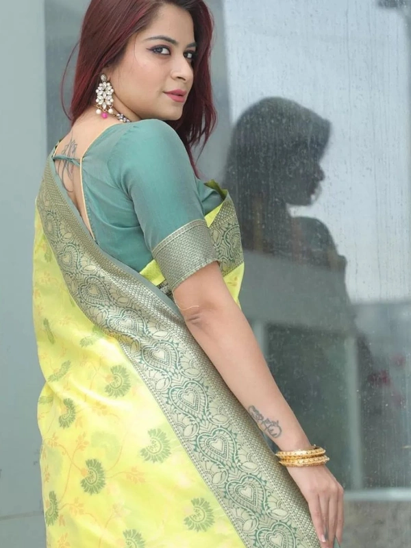 Yellow soft lichi silk jacquard jari work wedding wear saree