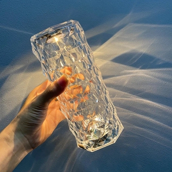 The Lune Crystal Lamp is a beautiful staple piece that can be used in any room. Simply tap it to turn it on and let it illuminate your space with its stunning crystal effect. Let it brighten up your day in just a few seconds.