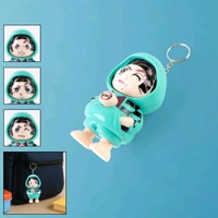 Cartoon Character Design Cute Action Figure Keychain – Cartoon-Inspired PVC Miniature Toy Keyring with Mixed Facial Expressions and Hooded Outfit