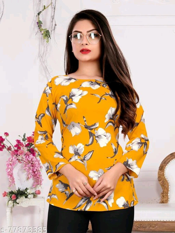 Fancy Graceful Women Tops & TunicsName: Fancy Graceful Women Tops & TunicsFabric: CrepeSleeve Length: Three-Quarter SleevesPattern: PrintedMultipack: 1 - Yellow, L