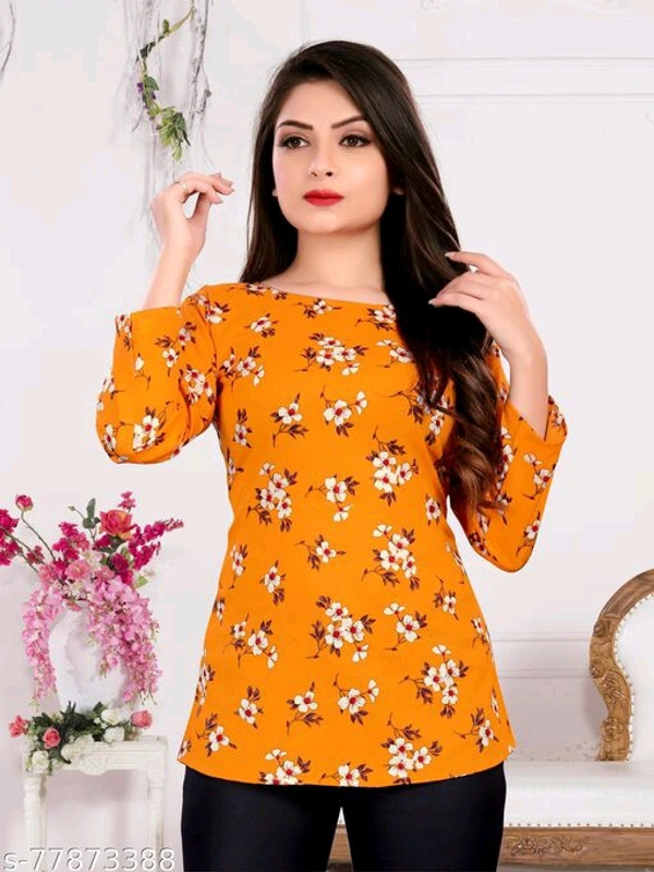 Fancy Graceful Women Tops & TunicsName: Fancy Graceful Women Tops & TunicsFabric: CrepeSleeve Length: Three-Quarter SleevesPattern: PrintedMultipack: 1 - Orange , M