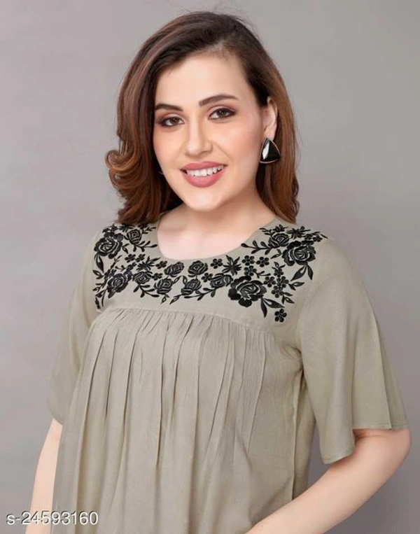 Women solid rayon fabric with embroider in yoke trending top - Creamy, XXL