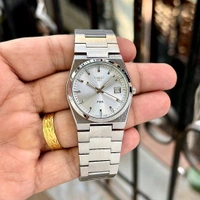 TISSOT PRX – ICONIC SWISS-INSPIRED ELEGANCE - Black