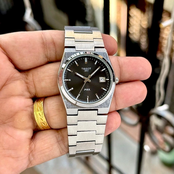 TISSOT PRX – ICONIC SWISS-INSPIRED ELEGANCE - Blue