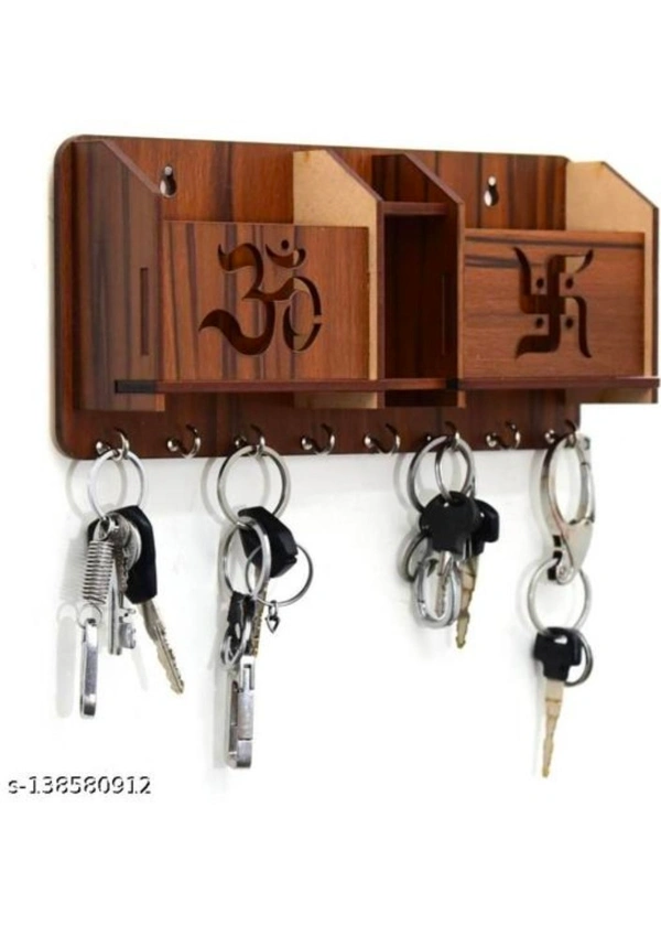 JAY Enterprises Wood Key Holder (8 Hooks)Name: JAY Enterprises Wood Key Holder (8 Hooks)Material: WoodenColor: BrownProduct Length: 10 InchProduct Height: 1.5 InchProduct Breadth: 0.5 InchNet Quantity (N): 1It is real trouble when you lose your keys. You have to make little space in your house where you can put your keys. So be creative and make that space interesting and stylish b