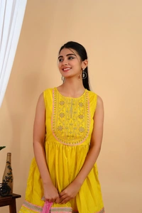 Premium heavy cotton lurex designer tire pattern gown with side slit detailed with heavy gota work all over. - M
