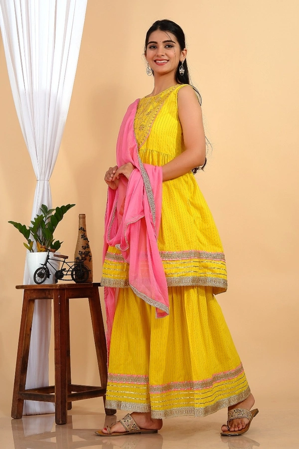Premium heavy cotton lurex designer tire pattern gown with side slit detailed with heavy gota work all over. - XL