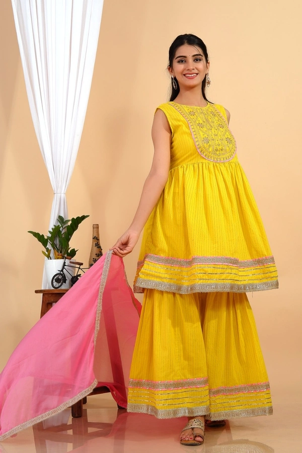Premium heavy cotton lurex designer tire pattern gown with side slit detailed with heavy gota work all over. - XL