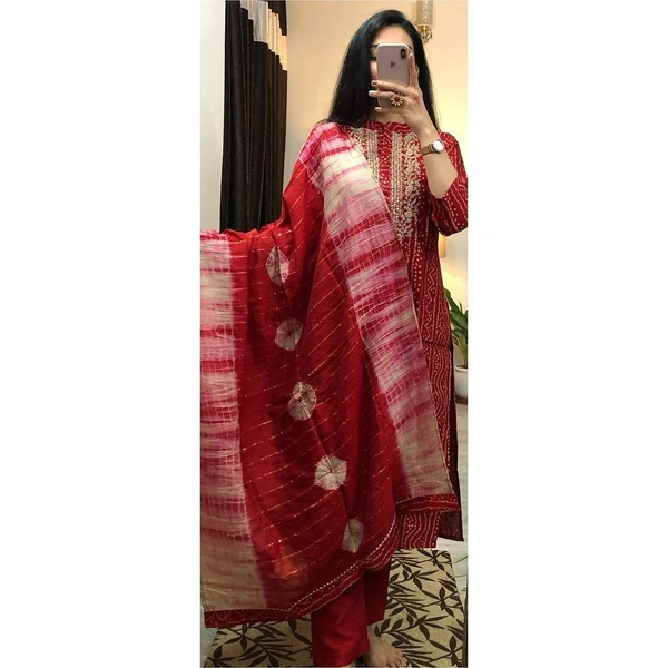 Bhandhani suit set with embroidered work on the neck with dyed sequin work duppta with gotta lace work.  - M