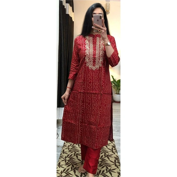 Bhandhani suit set with embroidered work on the neck with dyed sequin work duppta with gotta lace work.  - M