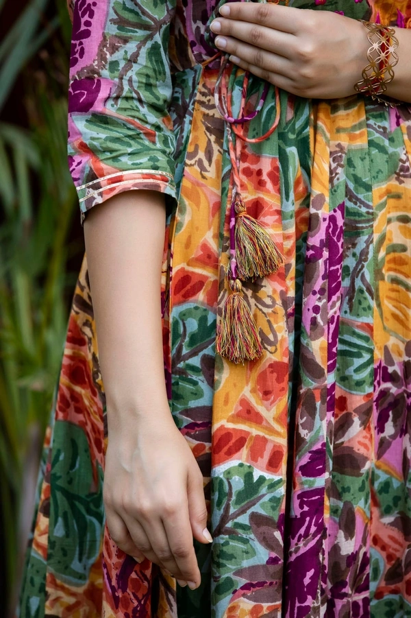 •  multi colour printed, long gown in 28kali, embroidery worked on yoke with beautiful side tussels - XL