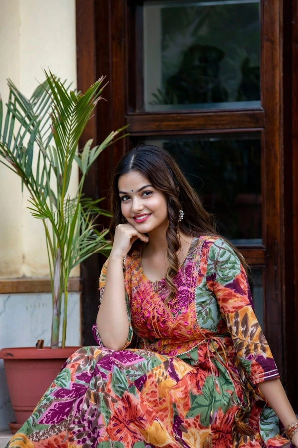 •  multi colour printed, long gown in 28kali, embroidery worked on yoke with beautiful side tussels - XL