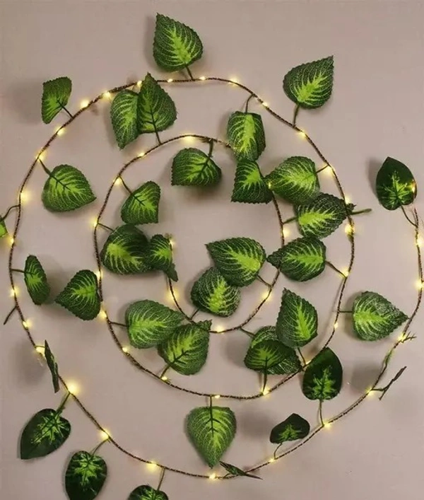 Samar BM Ecom BM Ecom 7Feet Money Plant Home Décor String Lights | Battery Operated Waterproof Copper Lights | Vine Garland Hanging for Wall, Bedroom, Window, Wedding, Festival, Party (30 LED, Warm White) - 7Feet