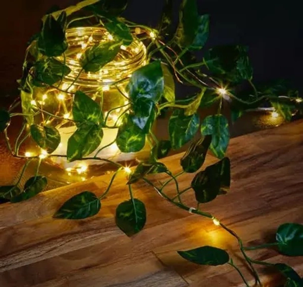 Samar BM Ecom BM Ecom 7Feet Money Plant Home Décor String Lights | Battery Operated Waterproof Copper Lights | Vine Garland Hanging for Wall, Bedroom, Window, Wedding, Festival, Party (30 LED, Warm White) - 7Feet