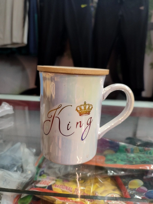 King Mug With Shiny Look And One Spoon And One Wooden Coaster