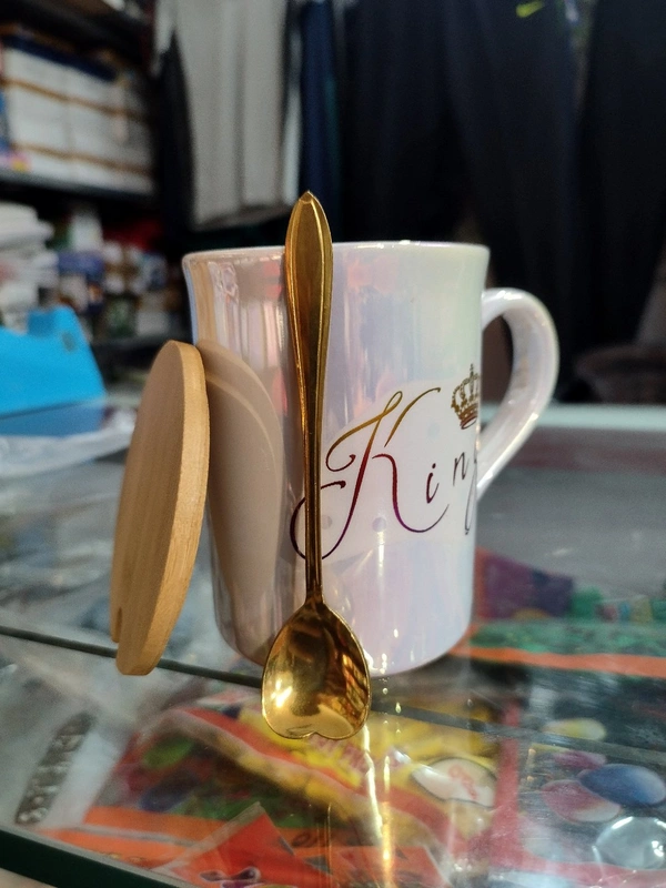 King Mug With Shiny Look And One Spoon And One Wooden Coaster
