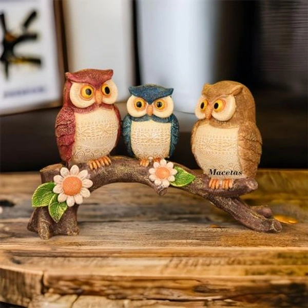 THREE OWL ON BRANCH