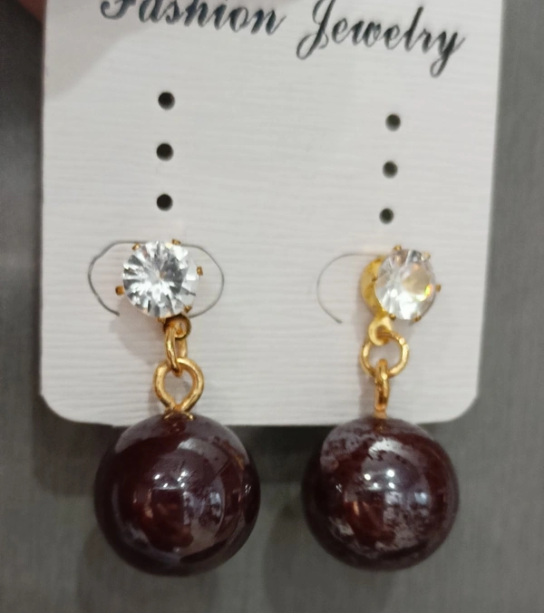 Chocolate Ball Earrings With an Elegant Stone